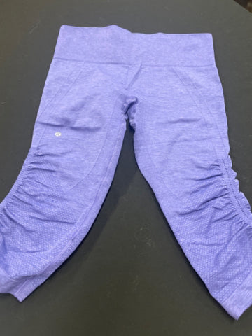 Lululemon Size 6 Cropped Purple Leggings